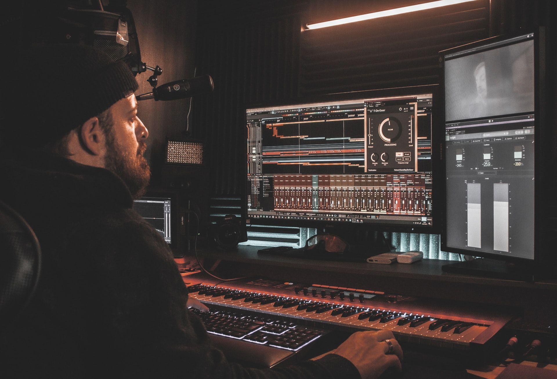 a person mixing music in a studio